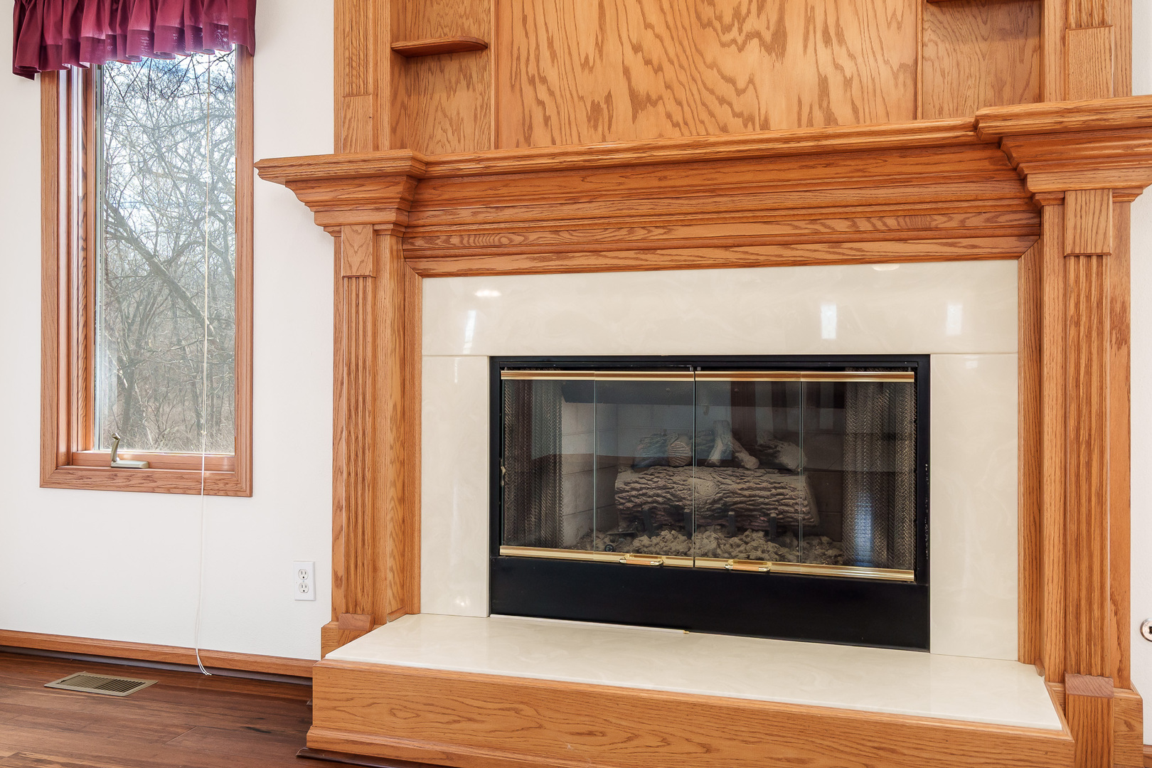 261 West Redtail Lane Oregon, IL 61061 - Photo 8 of 63 a close view of a fireplace in an empty room