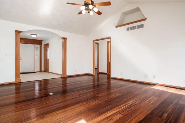 a kitchen with stainless steel appliances granite countertop a refrigerator and a stove
