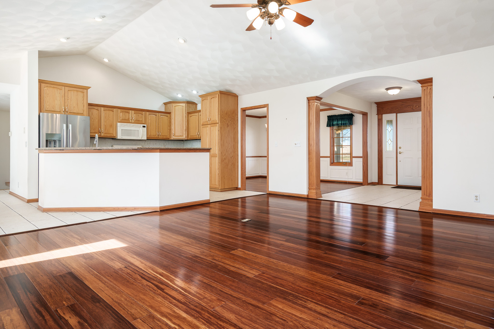 261 West Redtail Lane Oregon, IL 61061 - Photo 10 of 63 a view of a kitchen with a dishwasher cabinets and wooden floor