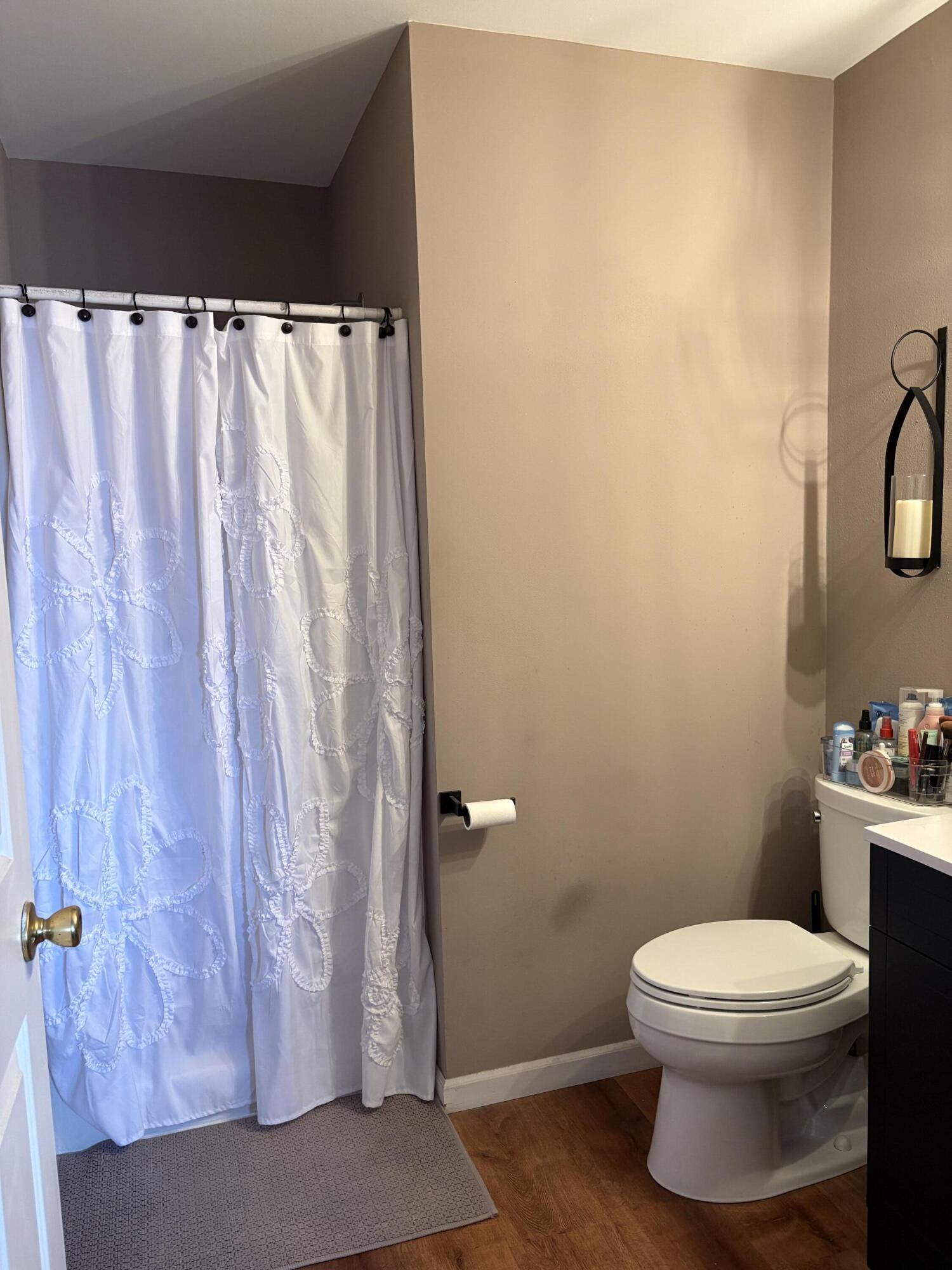 321 Davis Street, Unit 2 Elkhorn, WI 53121 - Photo 13 of 18 Owners Bath with Step in Shower