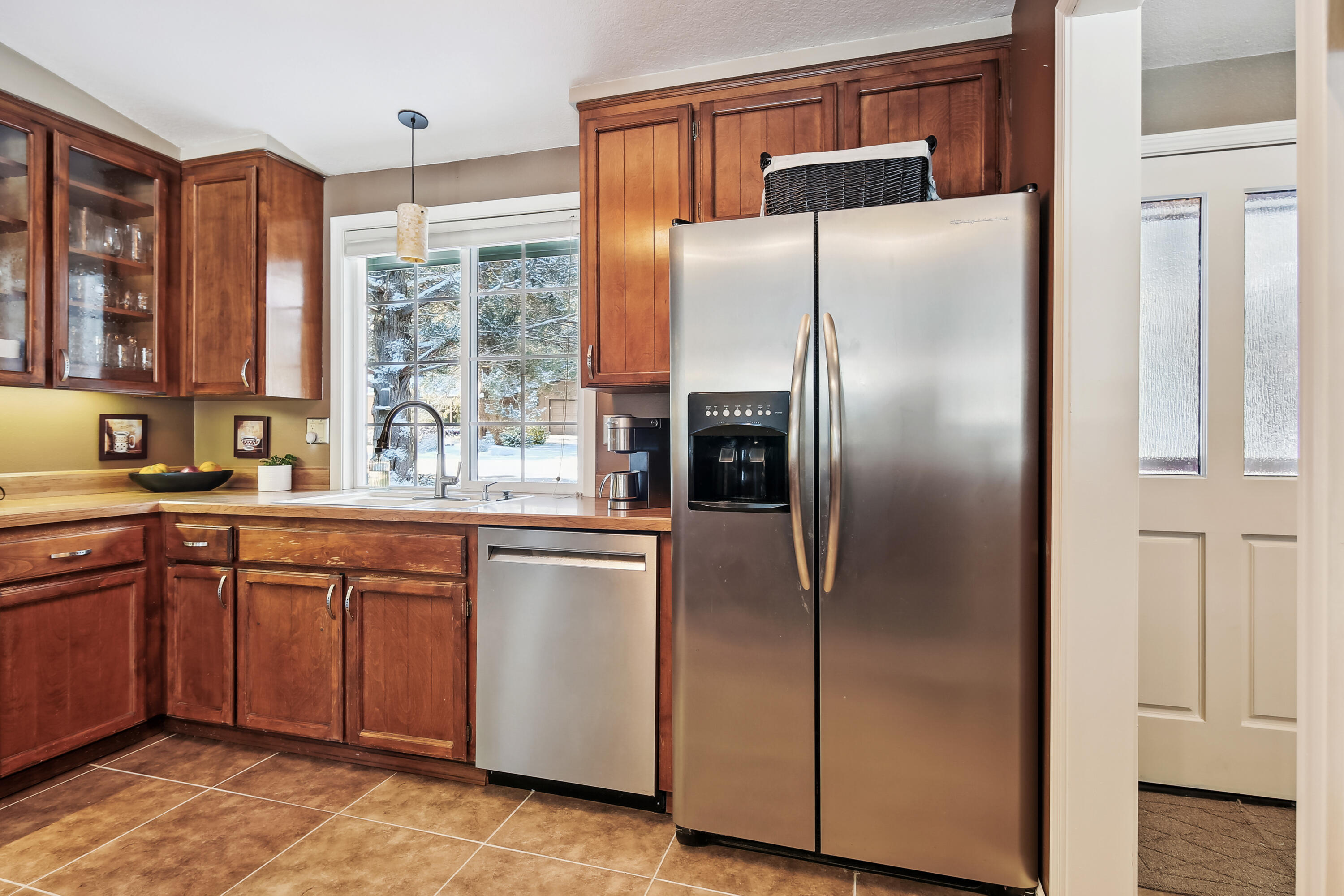20466 Mainline Road Bend, OR 97702 - Photo 12 of 35 a kitchen with stainless steel appliances granite countertop a refrigerator and a sink