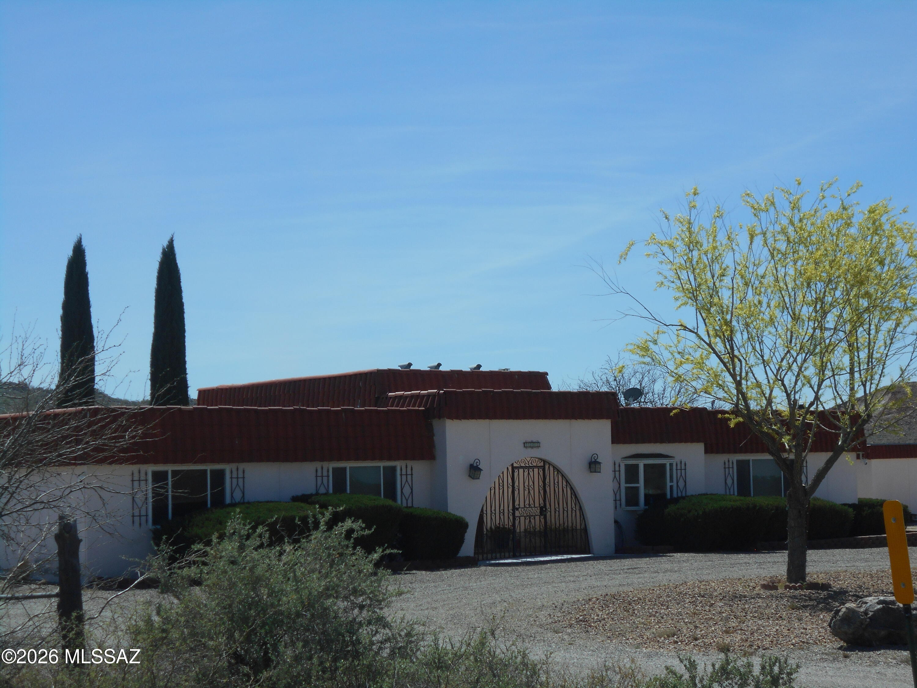 1201 East Old Stewart Road Willcox, AZ 85643 - Photo 2 of 49 a front view of a house with garden space