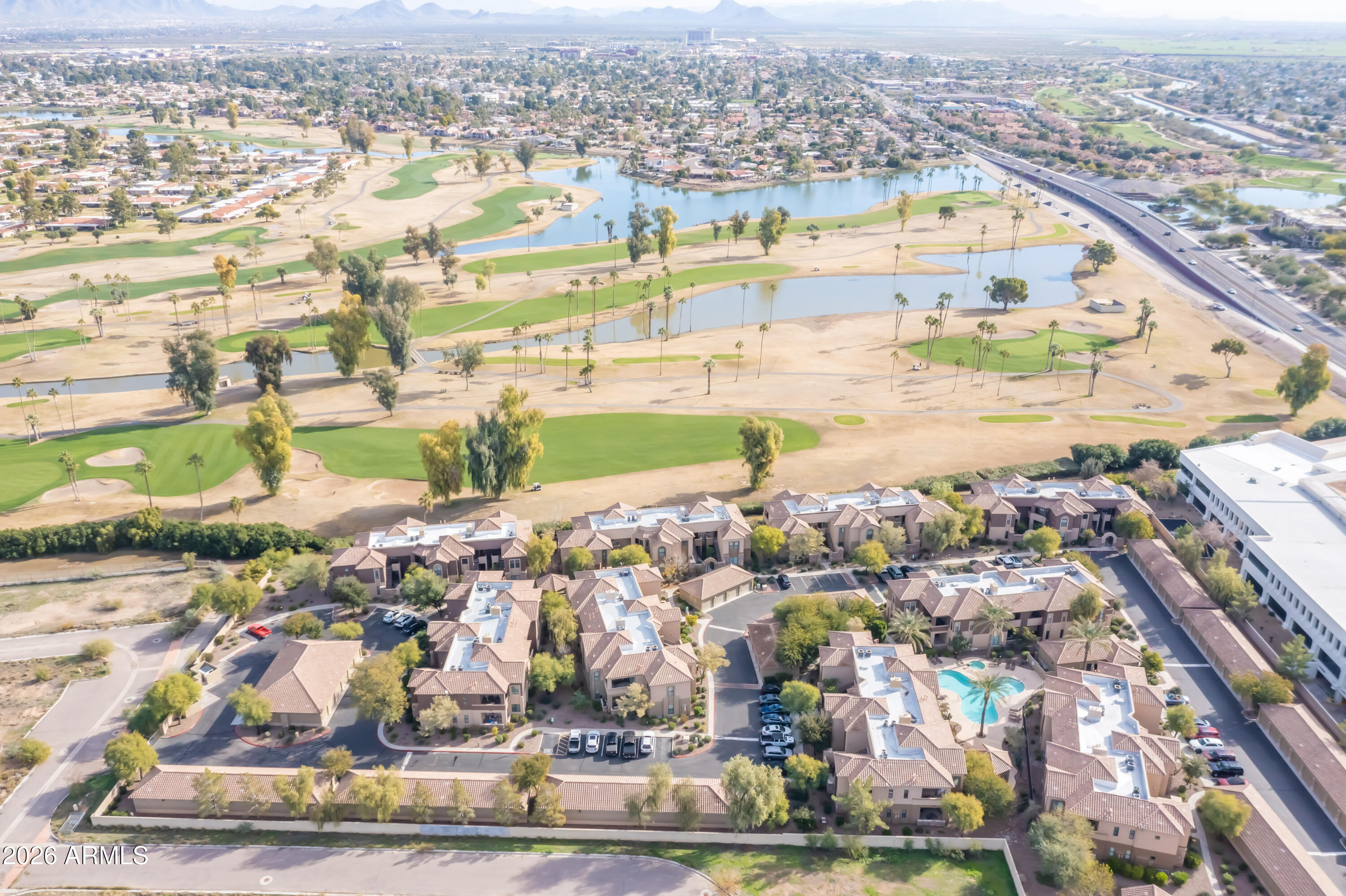 7027 North Scottsdale Road, Unit 132 Paradise Valley, AZ 85253 - Photo 45 of 48 an aerial view of residential houses with outdoor space