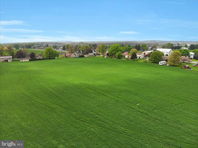 a yard with lots of green space