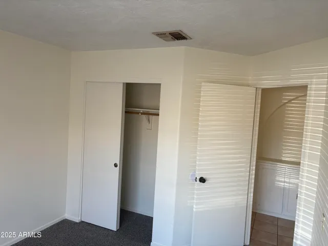 a view of a livingroom with wooden floor