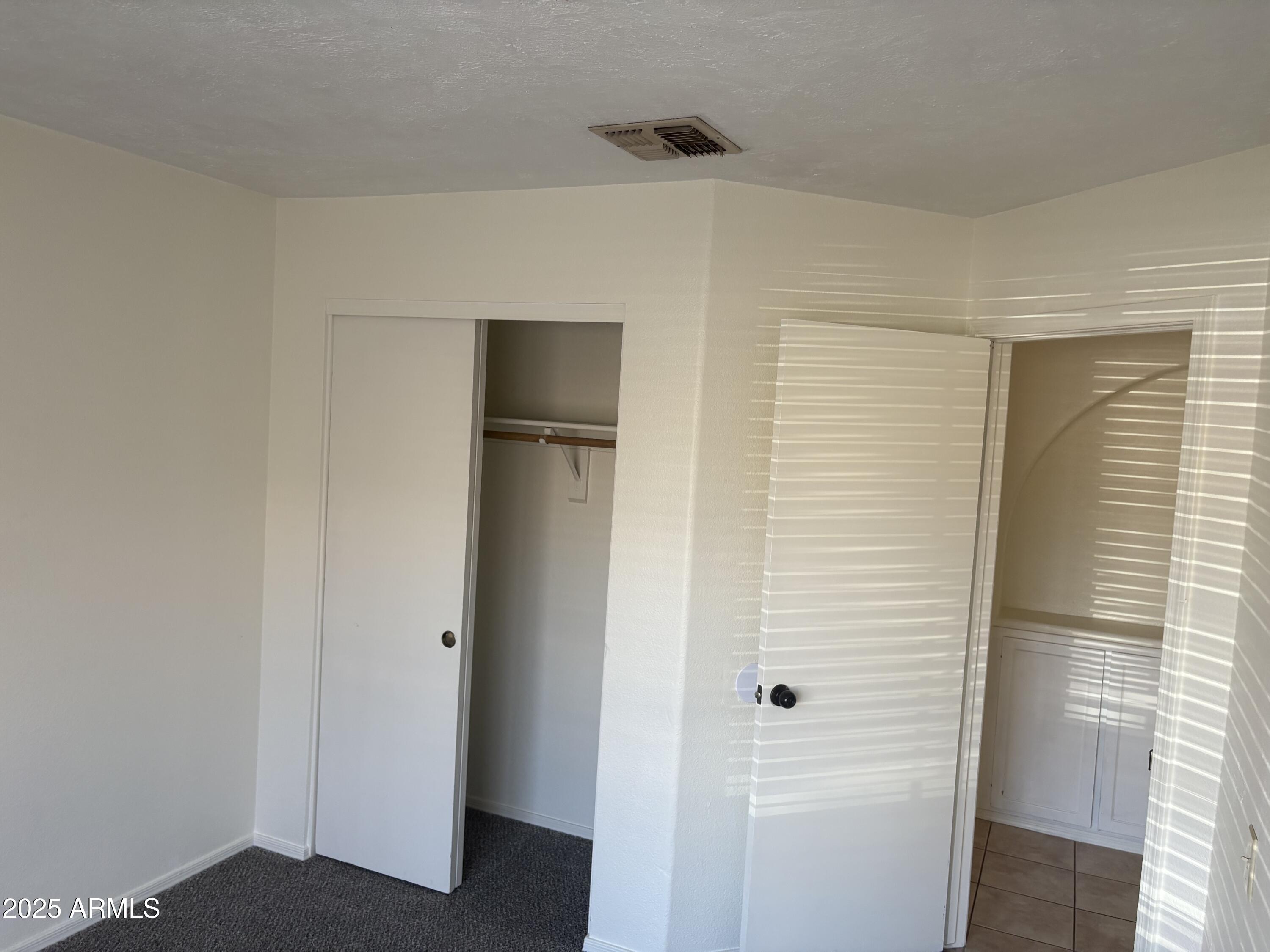 4661 West Whitten Street Chandler, AZ 85226 - Photo 15 of 17 a view of a livingroom with wooden floor