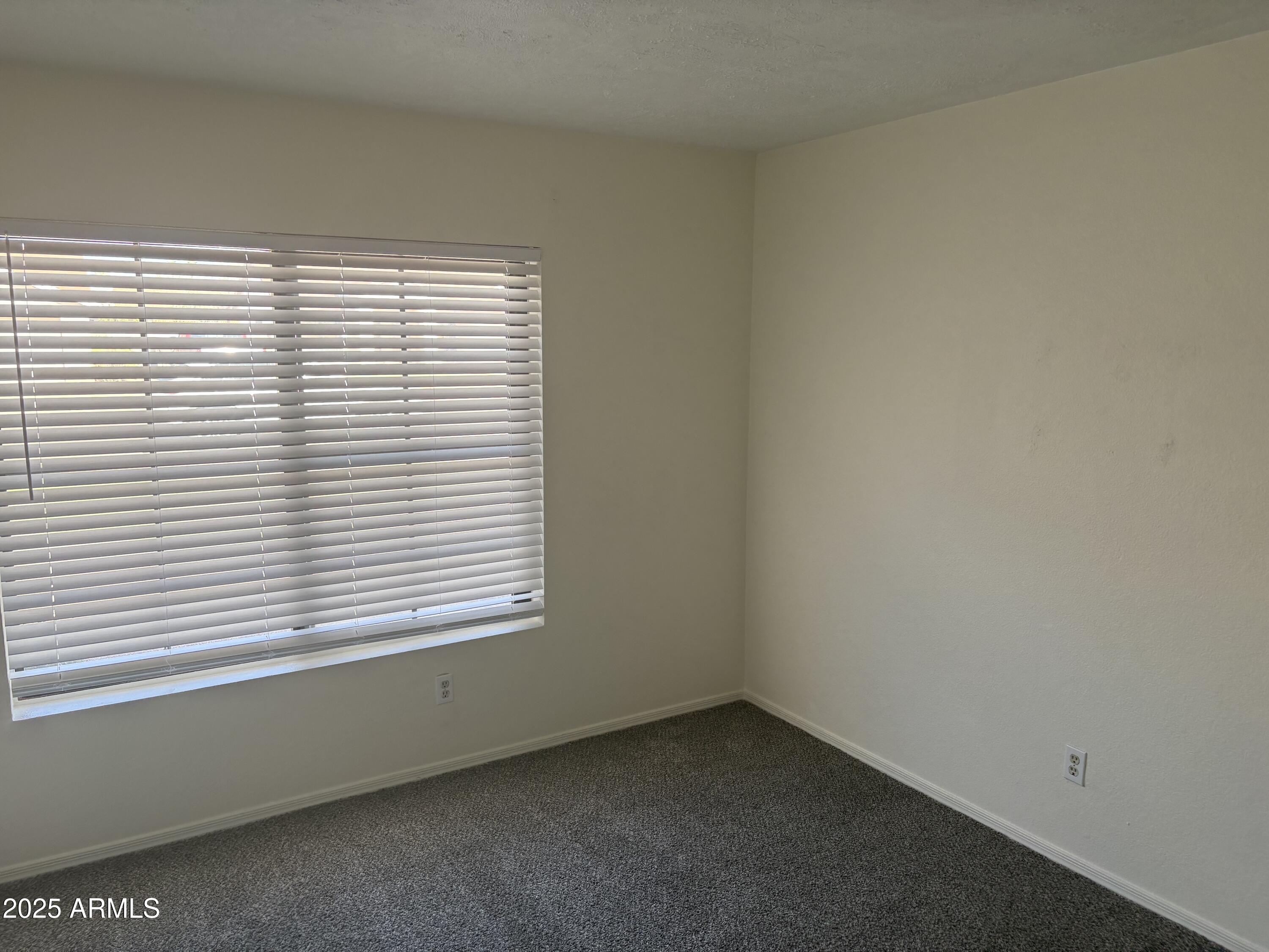 4661 West Whitten Street Chandler, AZ 85226 - Photo 16 of 17 an empty room with a window