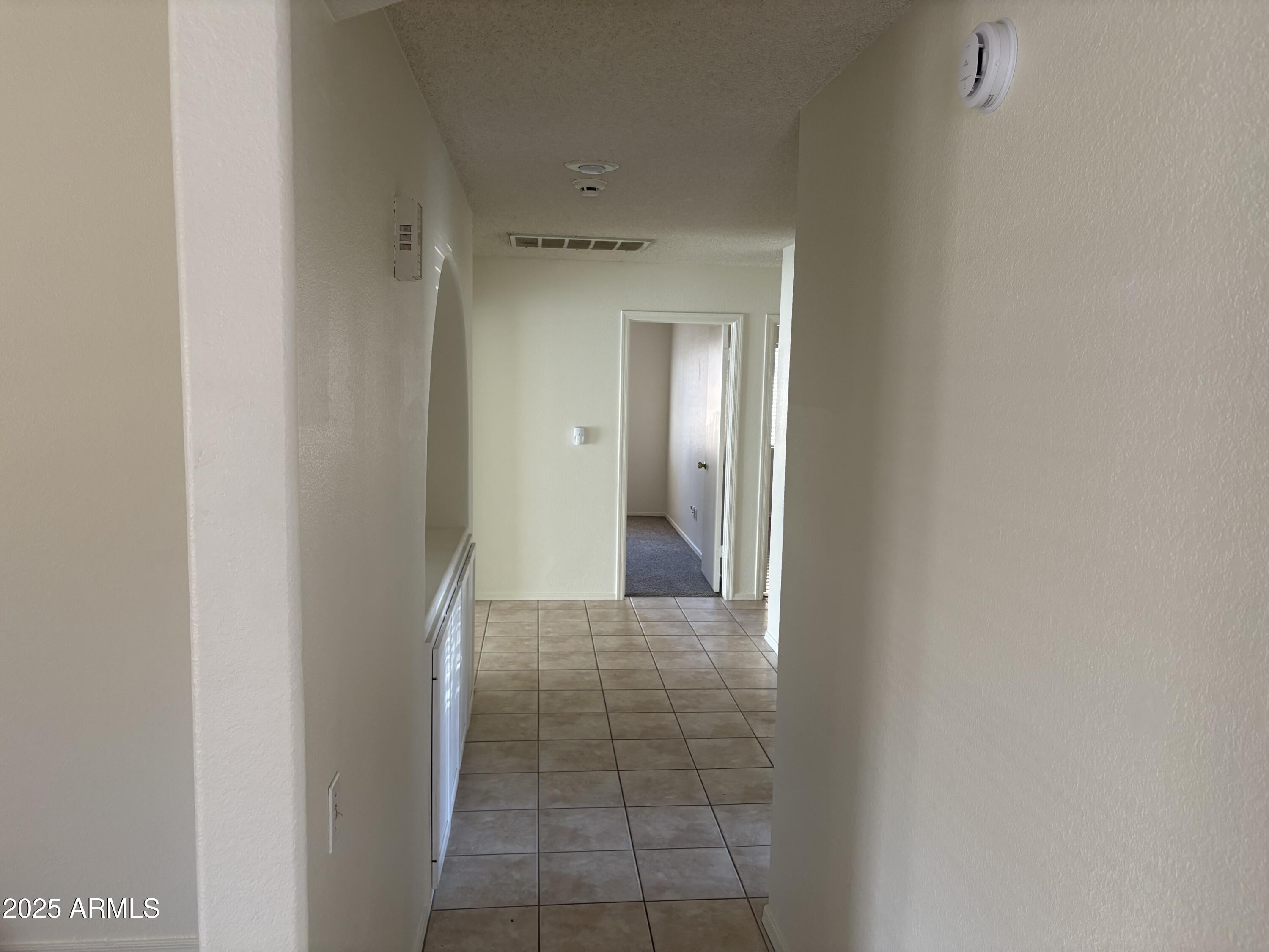 4661 West Whitten Street Chandler, AZ 85226 - Photo 17 of 17 a view of a hallway