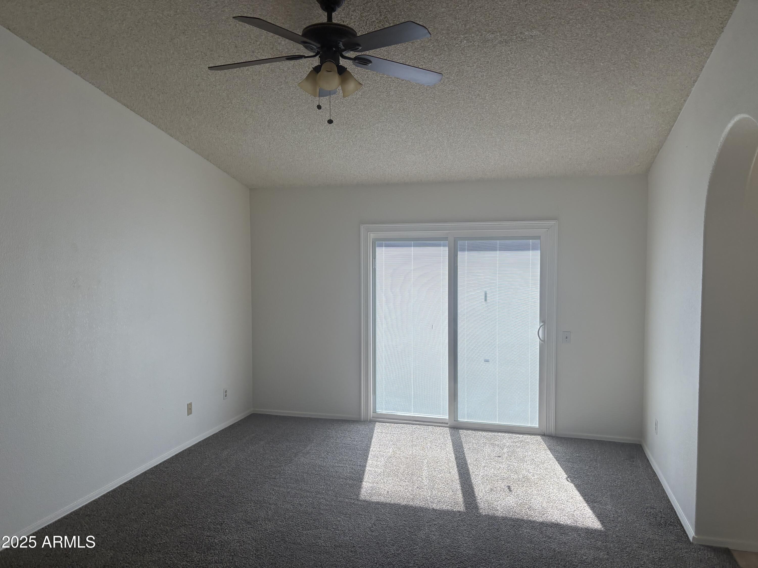 4661 West Whitten Street Chandler, AZ 85226 - Photo 9 of 17 an empty room with fan