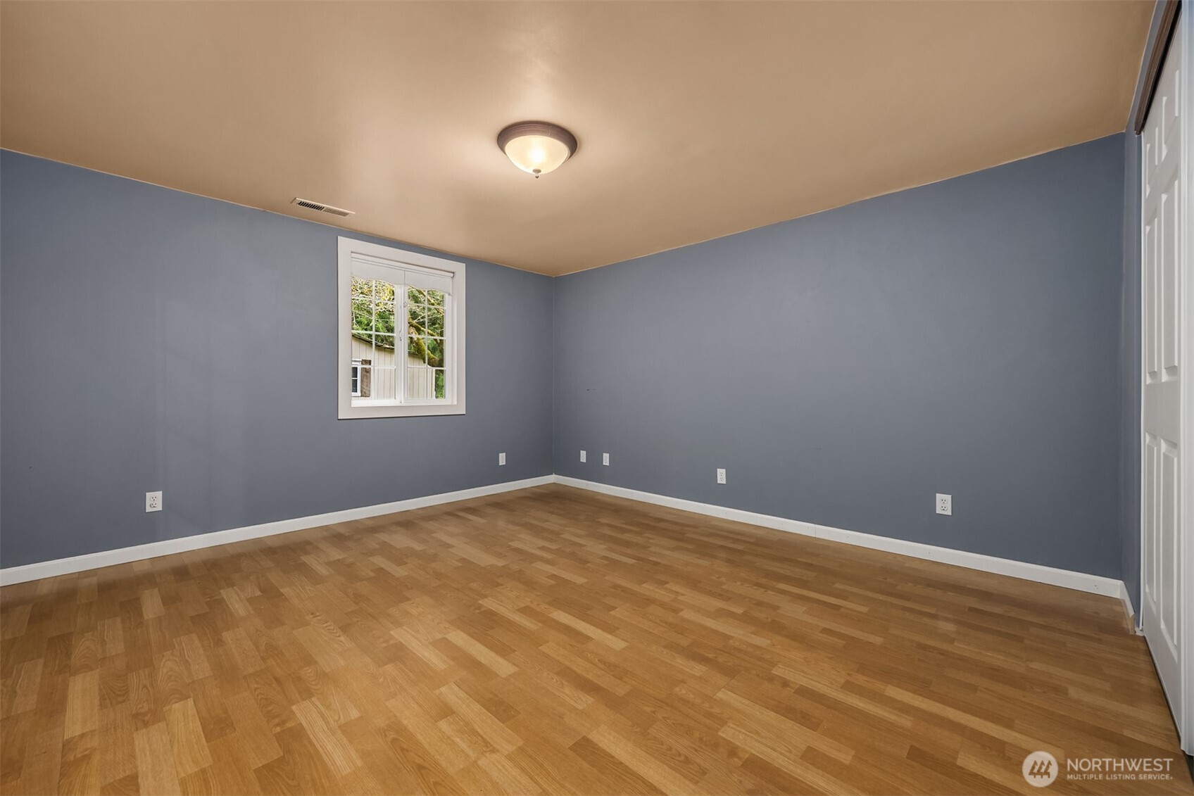 12620 Old Military Road Northeast Poulsbo, WA 98370 - Photo 14 of 35 a view of an empty room with a window