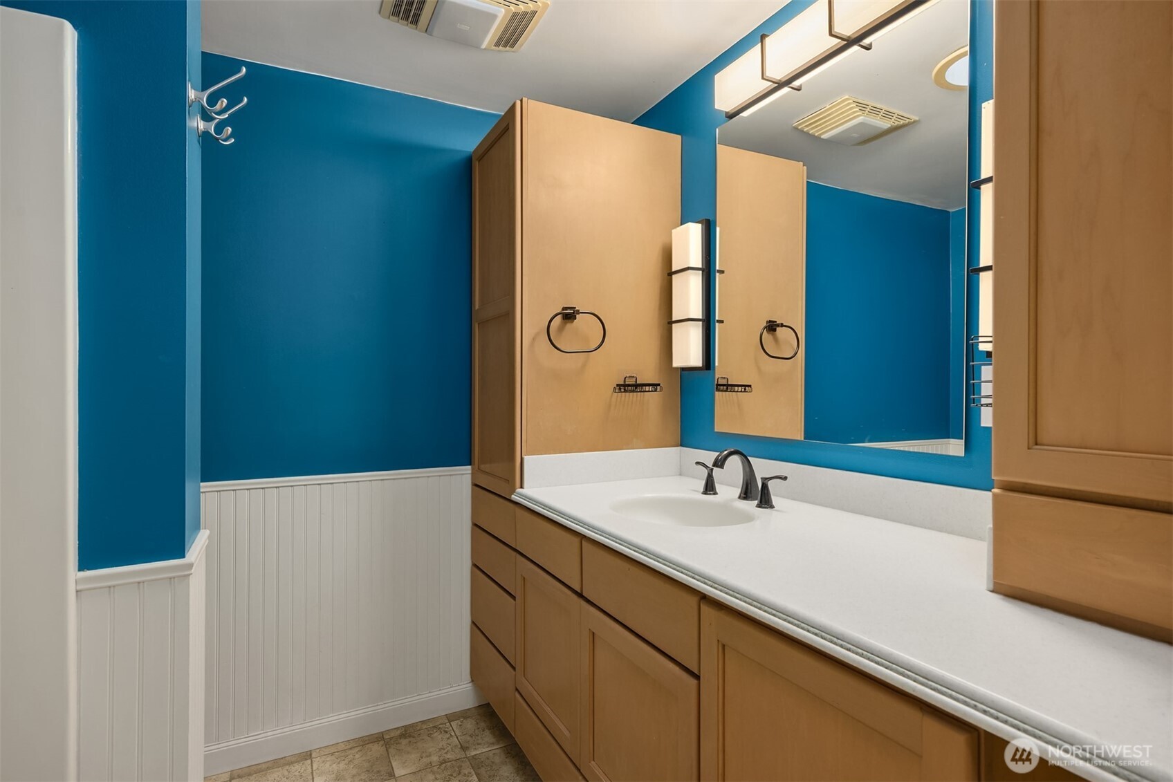 12620 Old Military Road Northeast Poulsbo, WA 98370 - Photo 16 of 35 a bathroom with a sink and a mirror