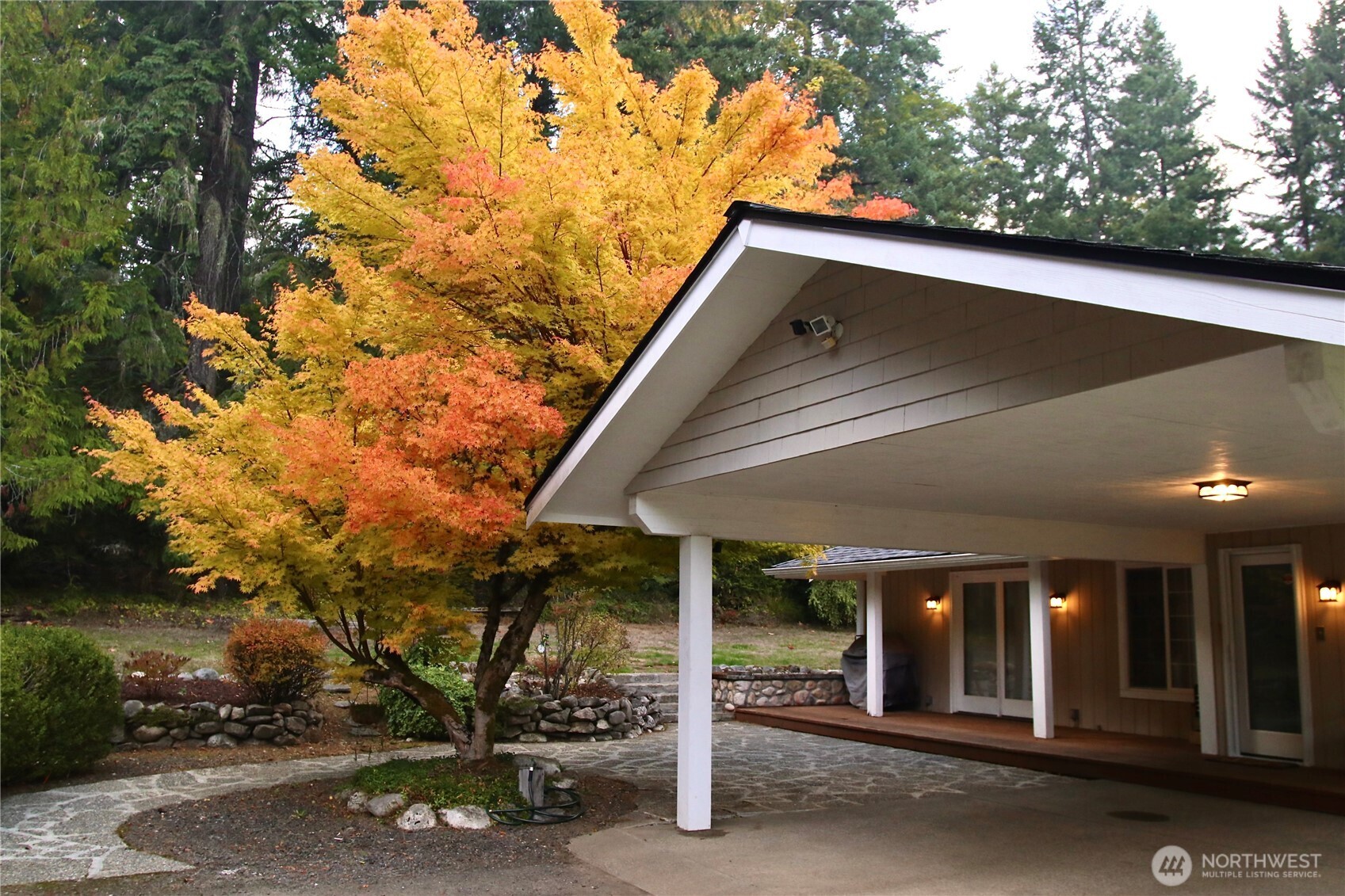 12620 Old Military Road Northeast Poulsbo, WA 98370 - Photo 2 of 35 a view of a wooden fence
