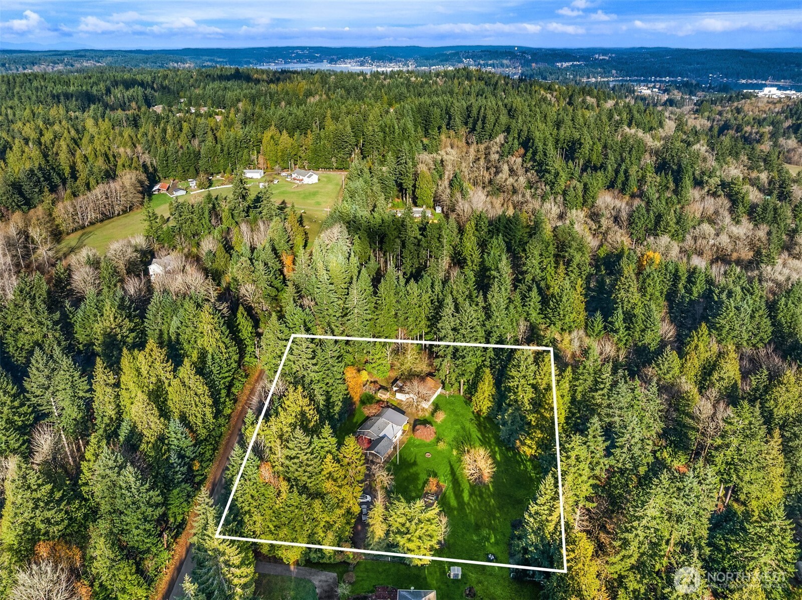 12620 Old Military Road Northeast Poulsbo, WA 98370 - Photo 34 of 35 a view of a city from a yard