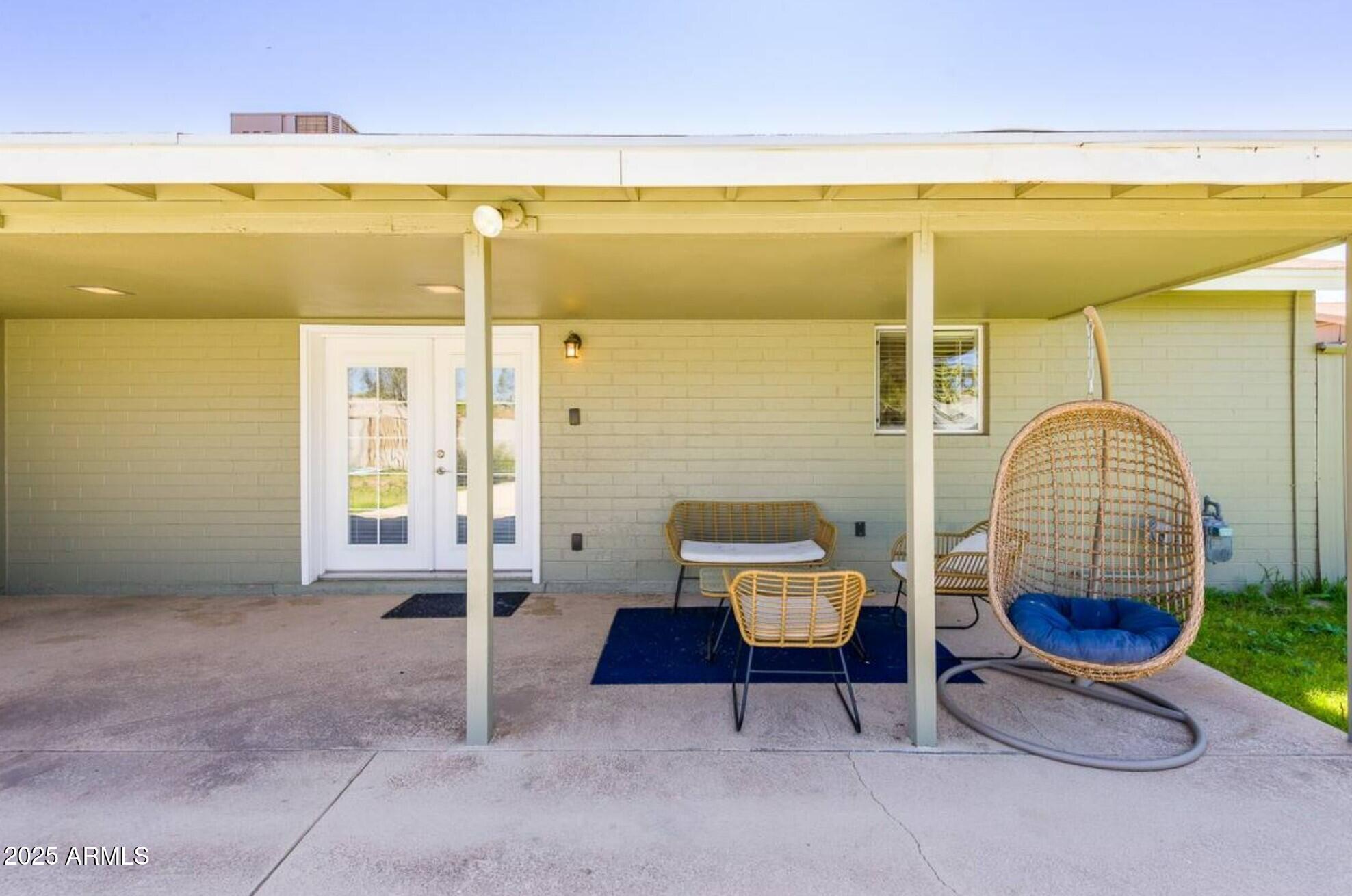 1612 West Geneva Drive Tempe, AZ 85282 - Photo 27 of 36 a living room with chairs