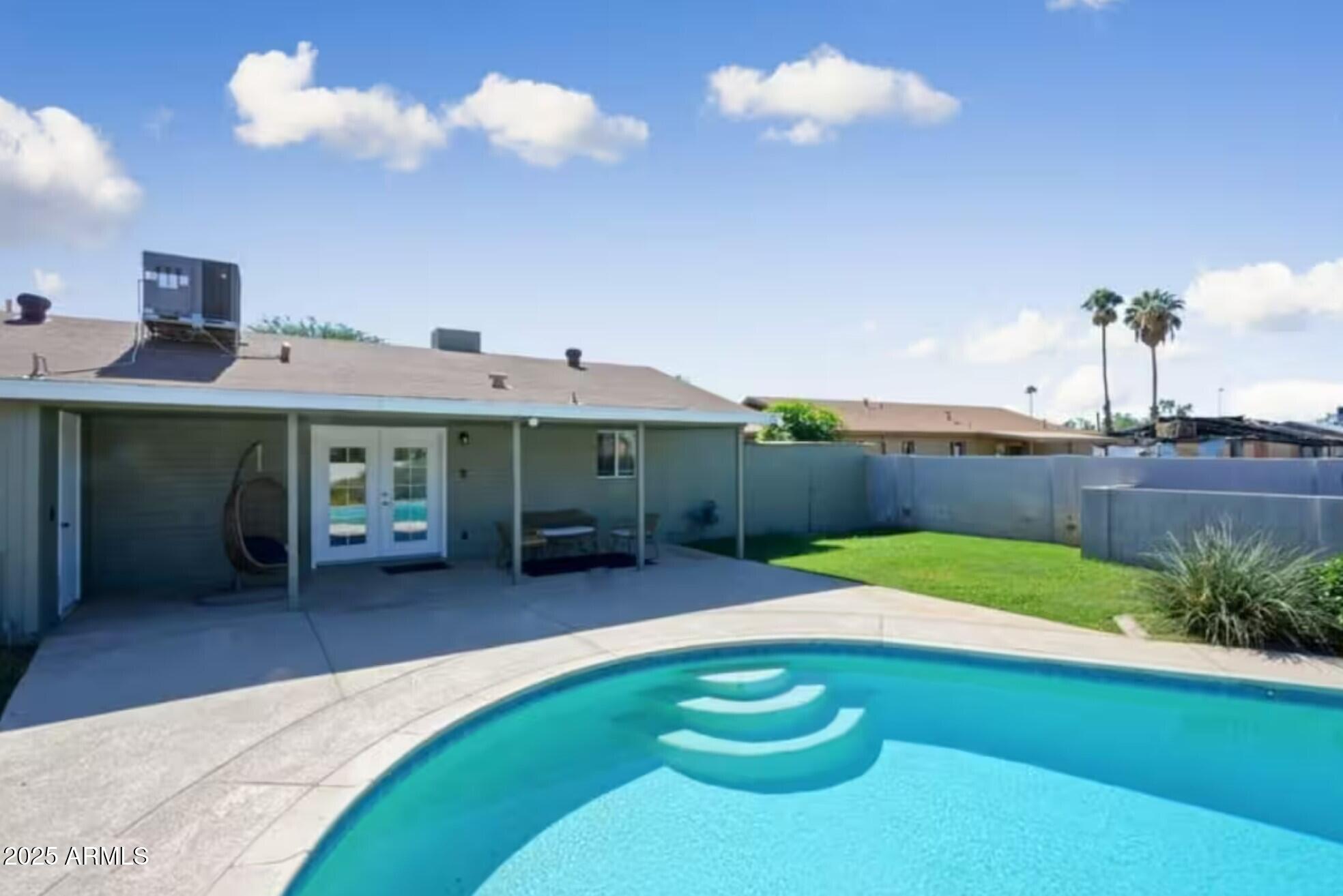 1612 West Geneva Drive Tempe, AZ 85282 - Photo 3 of 36 a view of a backyard with sitting area