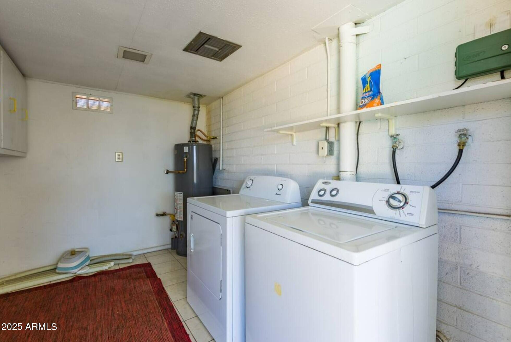 1612 West Geneva Drive Tempe, AZ 85282 - Photo 34 of 36 a utility room with dryer and washer