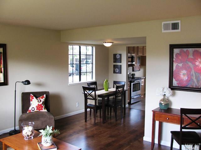 269 Playa Del Rey San Rafael, CA 94901 - Photo 1 of 1 a living room with furniture and wooden floor