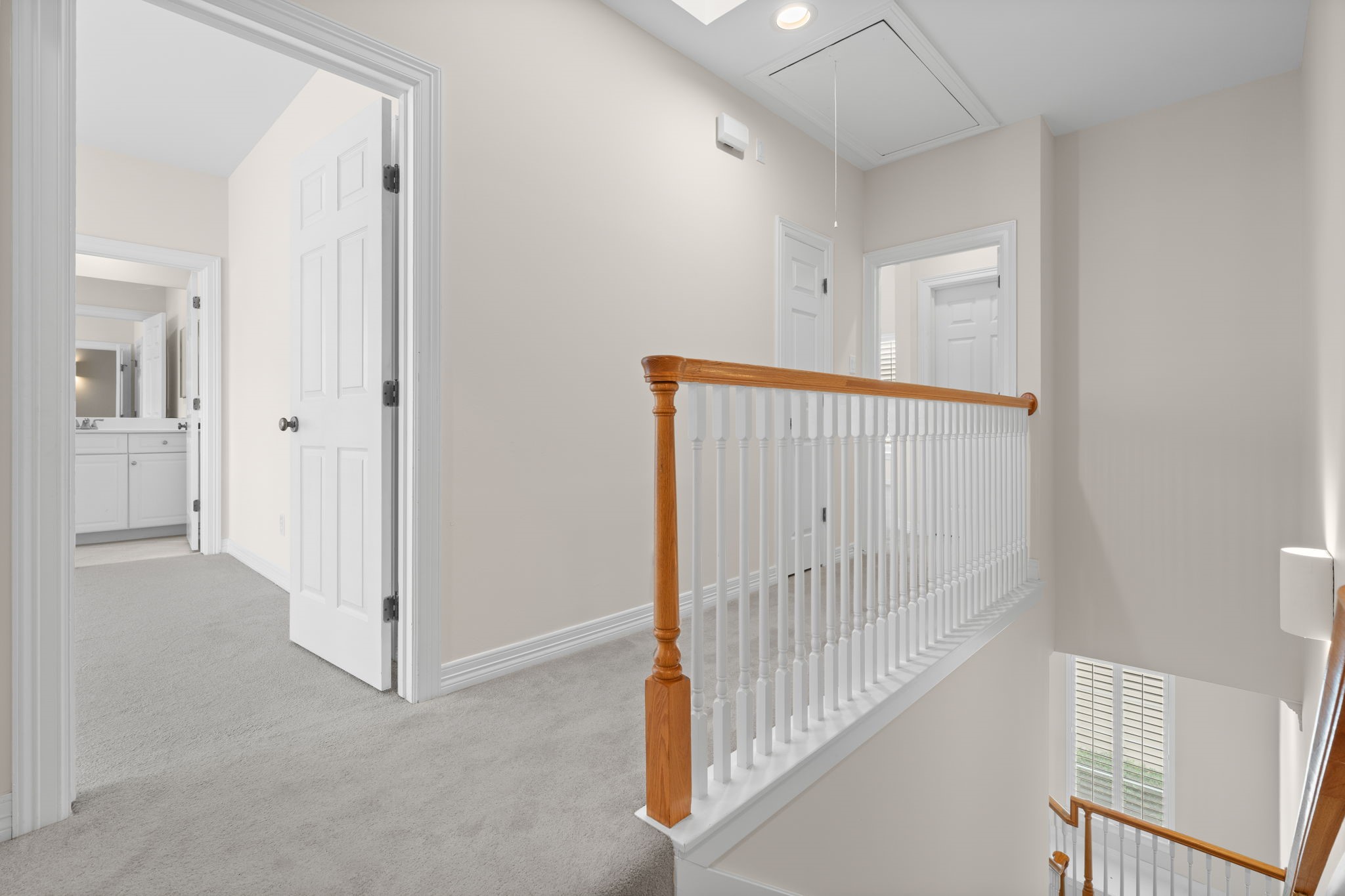 2196 Bancroft Lane Houston, TX 77027 - Photo 18 of 30 As you head up the stairs, you’ll find the primary suite along with the secondary bedroom, both designed with a neutral palette.