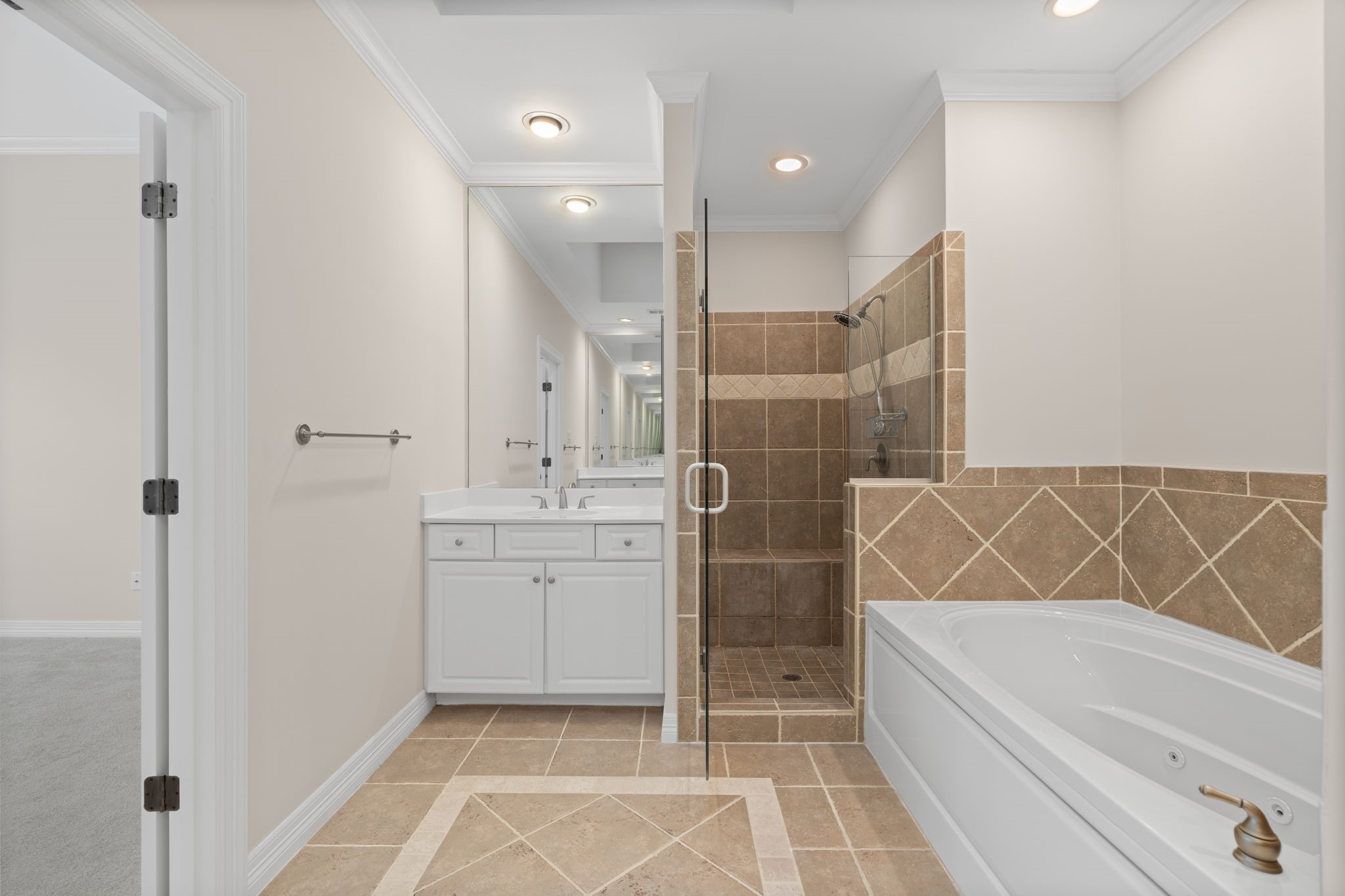 2196 Bancroft Lane Houston, TX 77027 - Photo 24 of 30 A jetted soaking tub and walk-in shower provide a luxurious spa-like experience.