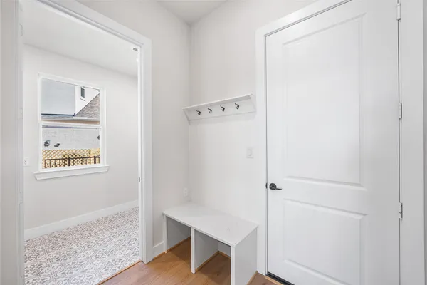 a view of a livingroom with a ceiling fan and window