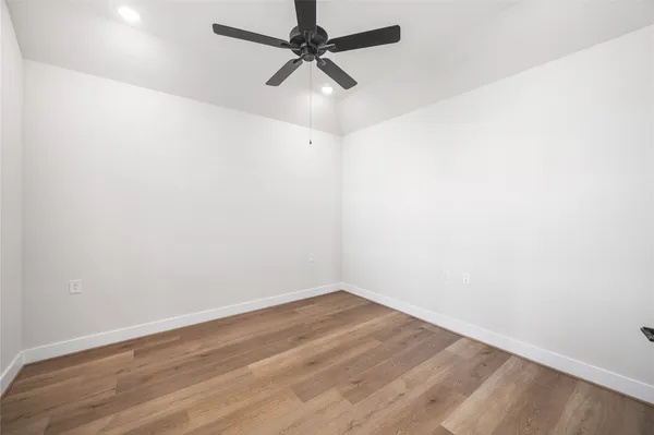 an aerial view of a house with a lake view