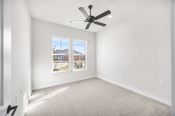 a kitchen with stainless steel appliances granite countertop a sink a stove and a wooden floors