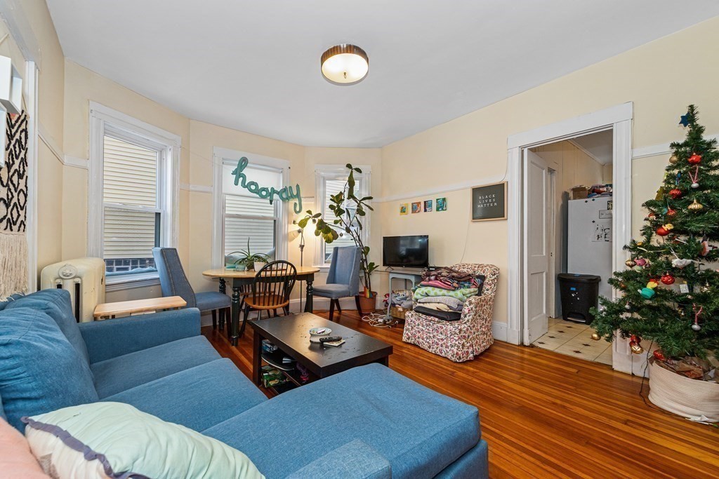 87 Parkton Road Boston, MA 02130 - Photo 23 of 42 a living room with furniture and a fireplace