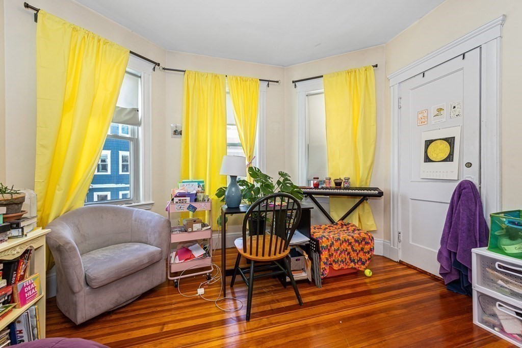 87 Parkton Road Boston, MA 02130 - Photo 26 of 42 a living room with furniture and a window