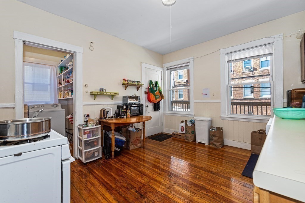 87 Parkton Road Boston, MA 02130 - Photo 38 of 42 a living room with furniture and a wooden floor