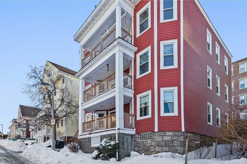 87 Parkton Road Boston, MA 02130 - Photo 42 of 42 a front view of a multi story building