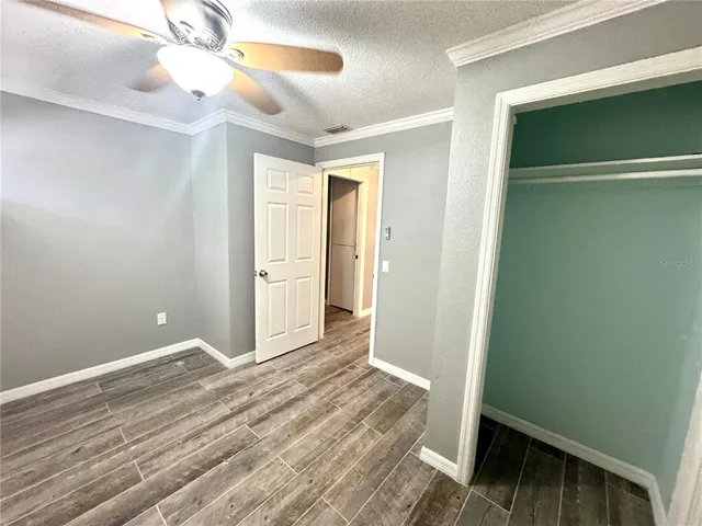 a view of entryway with wooden floor