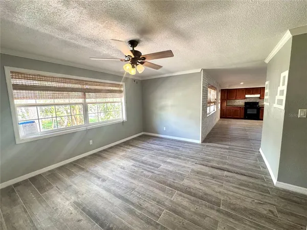 a view of an empty room with a window