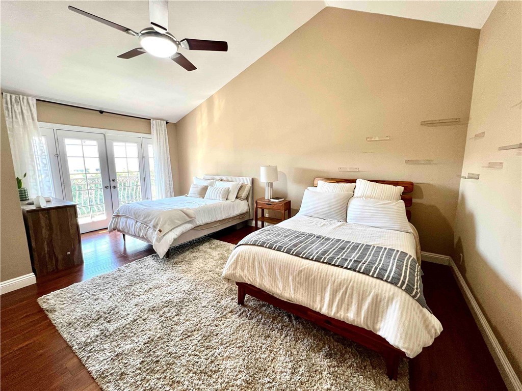 500 Silver Canyon Way Brea, CA 92821 - Photo 11 of 24 a bedroom with two beds and wooden floor