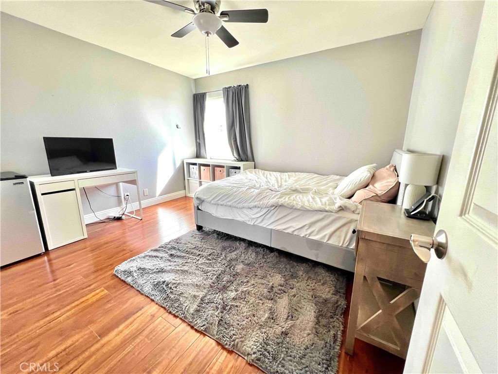 500 Silver Canyon Way Brea, CA 92821 - Photo 21 of 24 a bedroom with a bed window and a flat screen tv