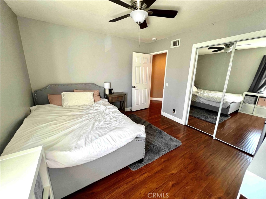 500 Silver Canyon Way Brea, CA 92821 - Photo 22 of 24 a bedroom with a bed and a mirror