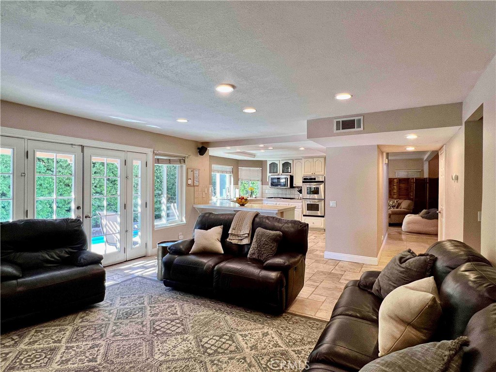 500 Silver Canyon Way Brea, CA 92821 - Photo 5 of 24 a living room with furniture and a large window