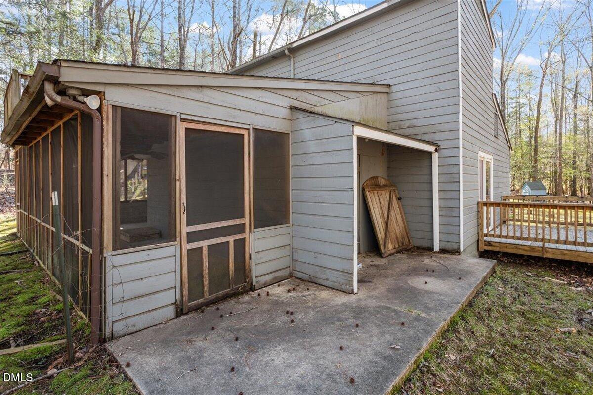 1423 Alderman Circle Raleigh, NC 27603 - Photo 11 of 37 a view of a porch with a door