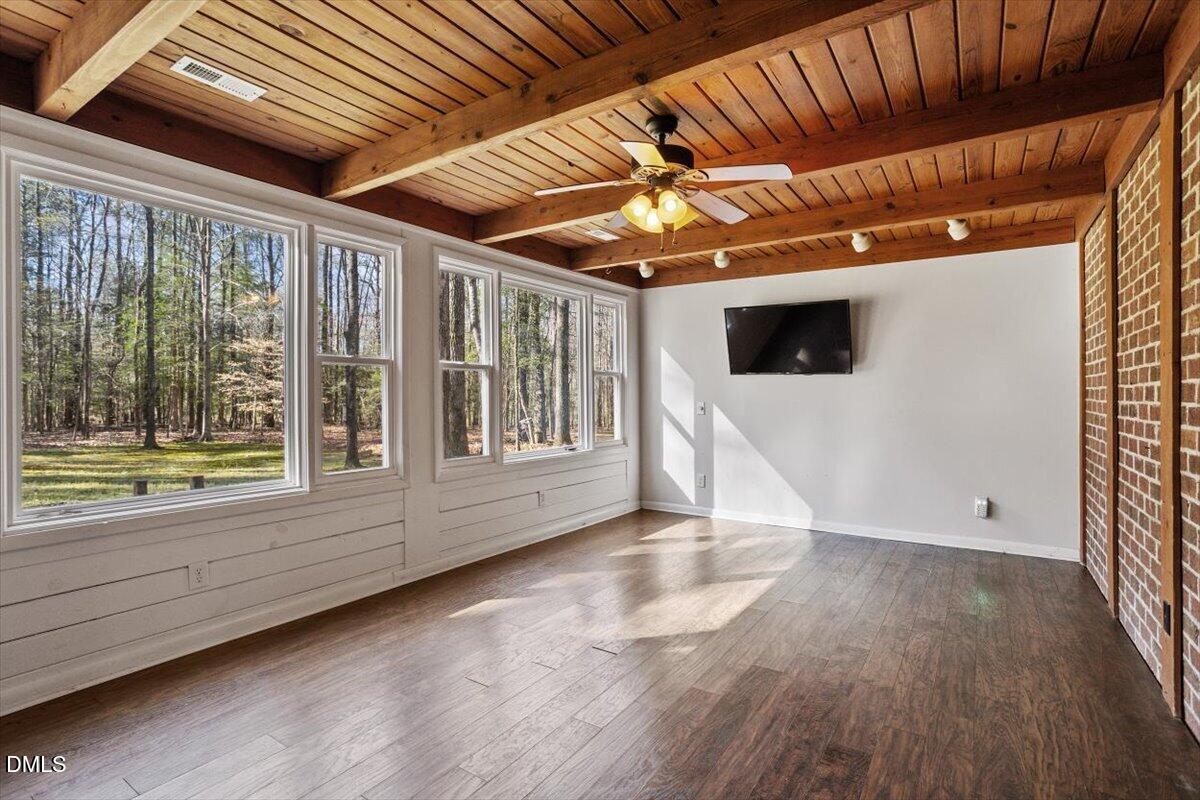 1423 Alderman Circle Raleigh, NC 27603 - Photo 19 of 37 a view of an empty room with wooden floor and a window