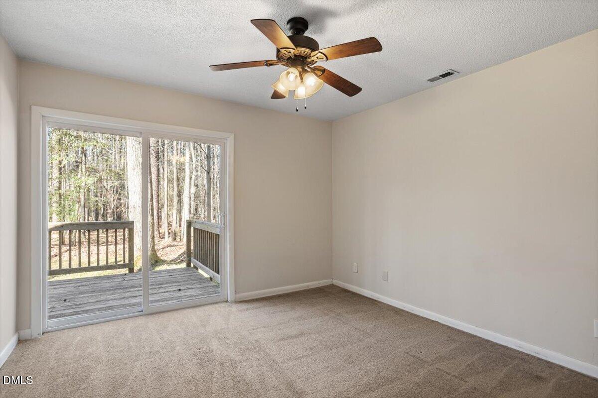 1423 Alderman Circle Raleigh, NC 27603 - Photo 30 of 37 a view of an empty room with a window