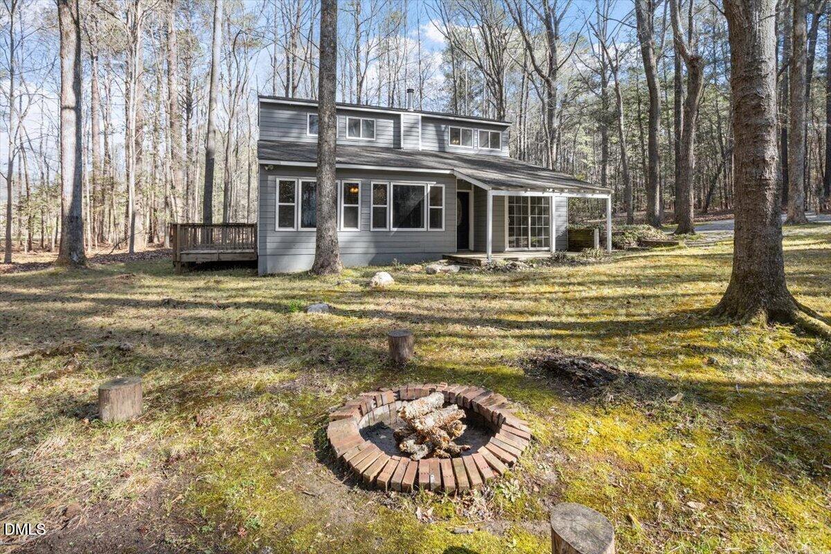 1423 Alderman Circle Raleigh, NC 27603 - Photo 3 of 37 a swimming pool with a outdoor seating
