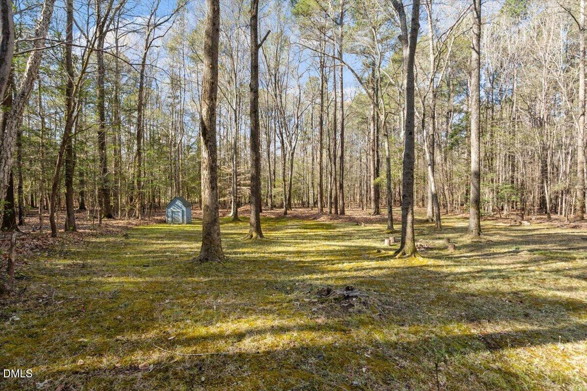 1423 Alderman Circle Raleigh, NC 27603 - Photo 7 of 37 a view of swimming pool with an outdoor space and seating