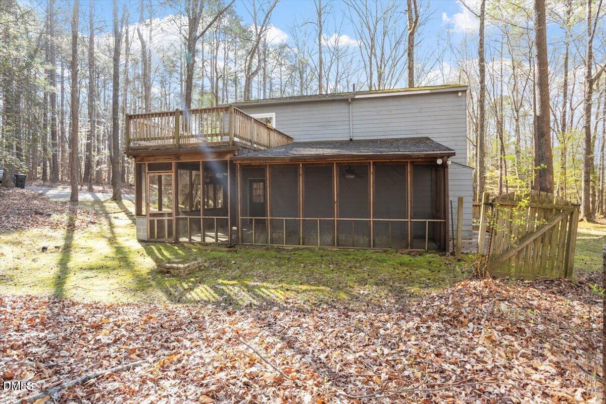 1423 Alderman Circle Raleigh, NC 27603 - Photo 10 of 37 a view of yellow house with a yard