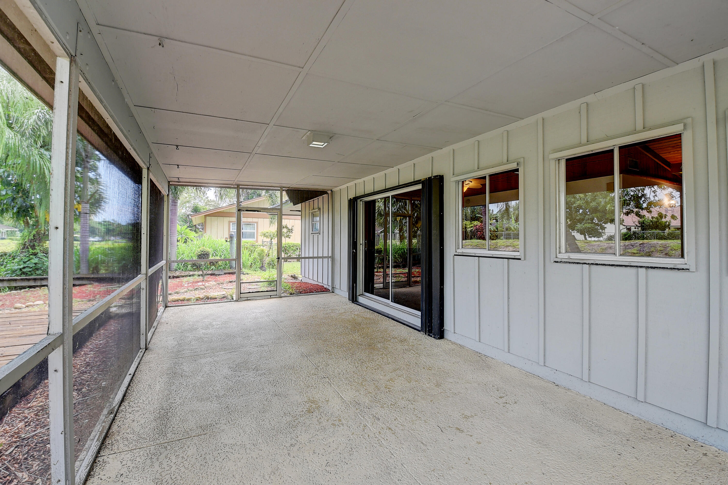 1023 Northwest 7th Street Boca Raton, FL 33486 - Photo 9 of 27 Screened Porch