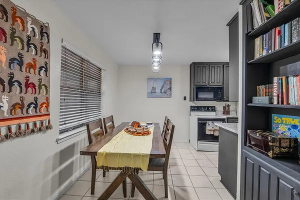 a view of a livingroom with furniture and window