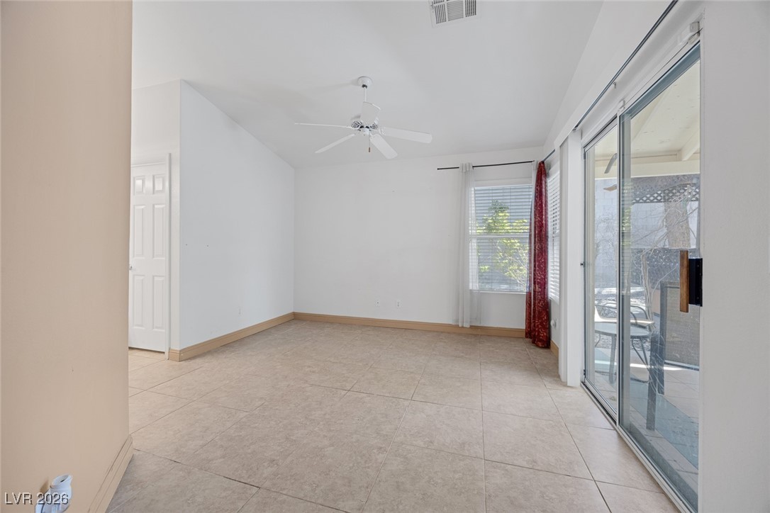 2427 Worchester Road Henderson, NV 89074 - Photo 18 of 35 Spare room with light tile patterned floors and a ceiling fan