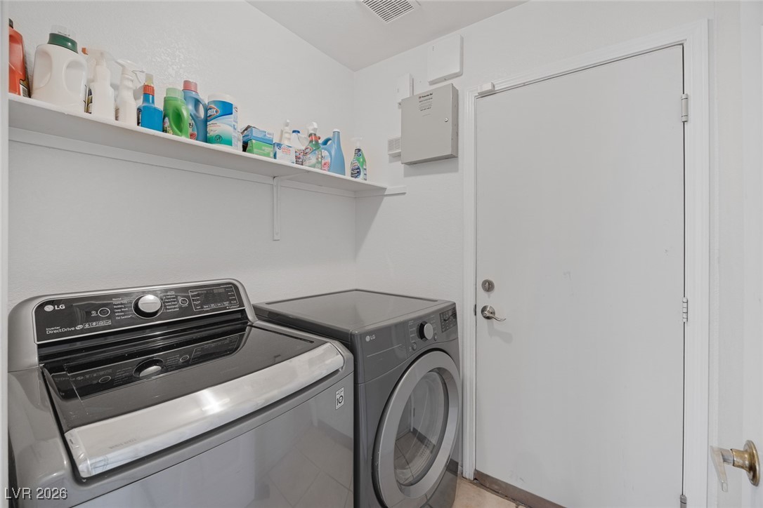 2427 Worchester Road Henderson, NV 89074 - Photo 27 of 35 Laundry area featuring washer and clothes dryer