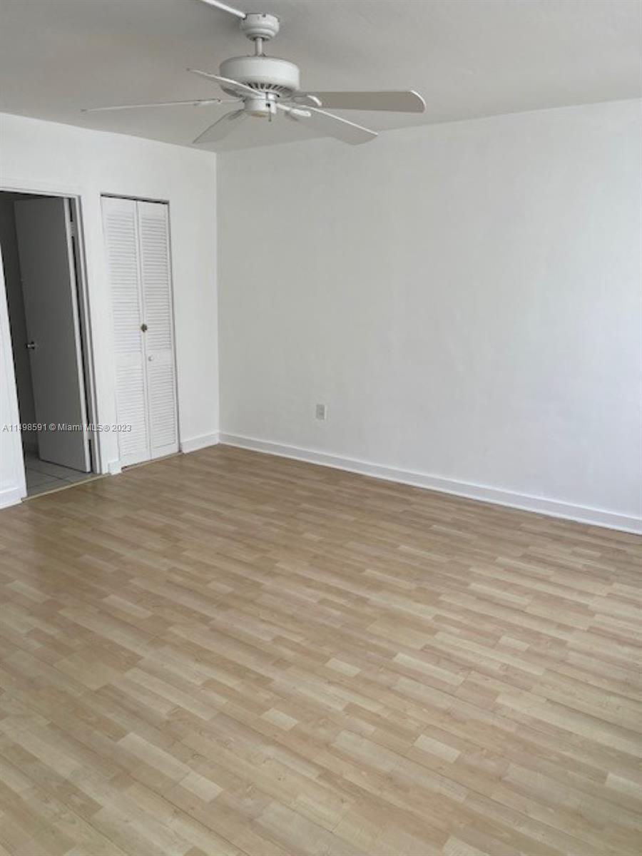 Millionaire's Row Miami Beach, FL 33140 - Photo 5 of 16 wooden floor in an empty room