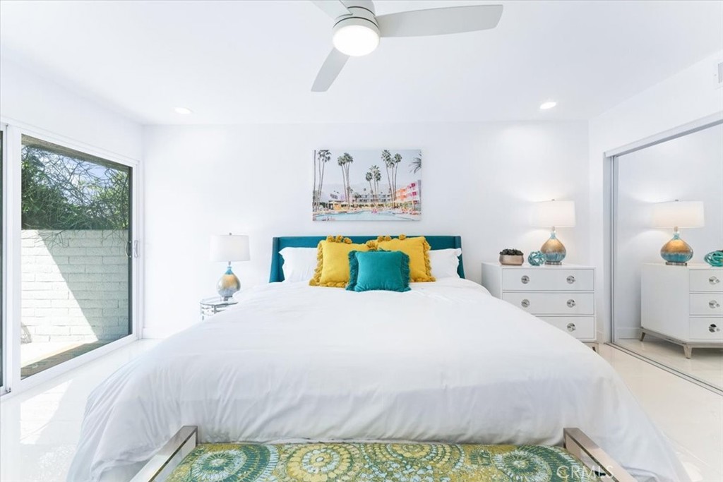1111 Ramon Road, Unit 87 Palm Springs, CA 92264 - Photo 26 of 54 a bedroom with a bed and window