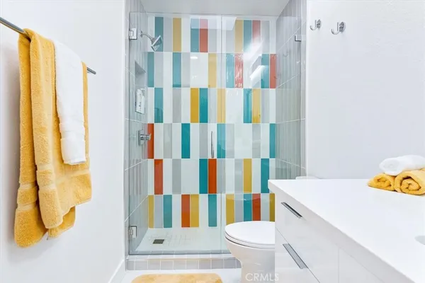 a bedroom with bed and window