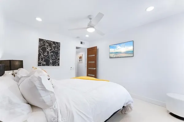 a view of a patio with chairs and tables